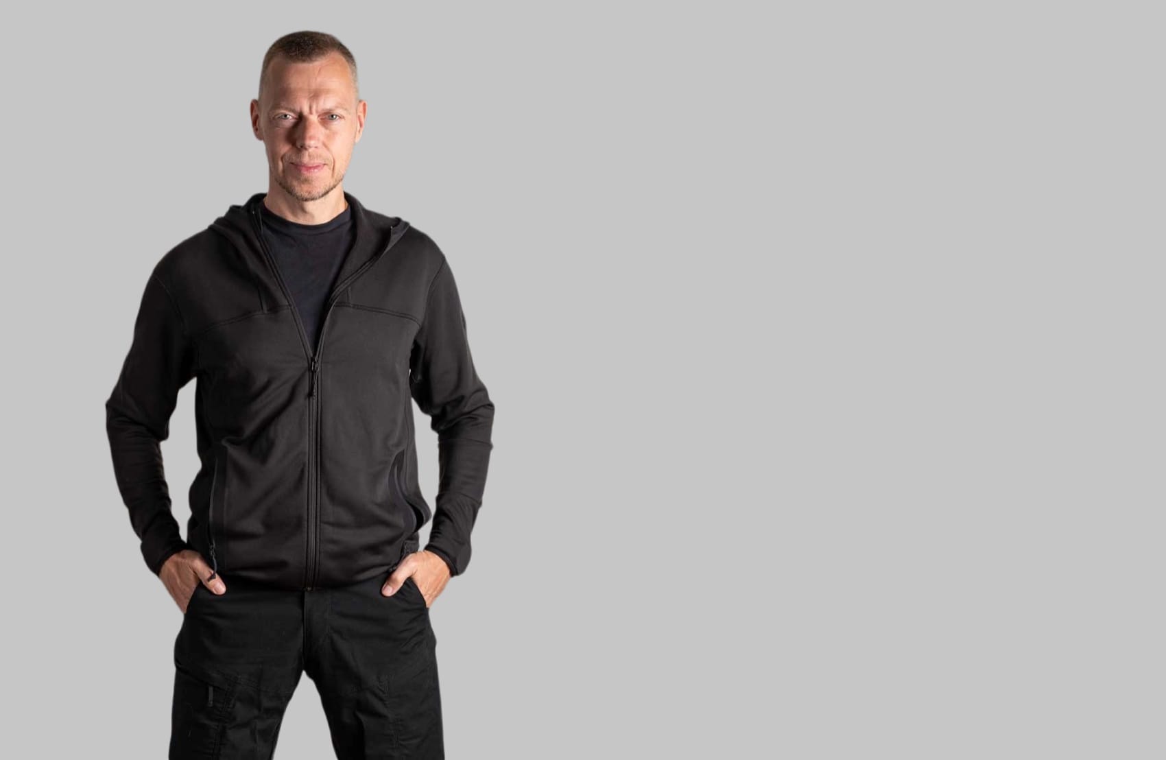 Frederik Bisbjerg, portrait against a neutral studio backdrop